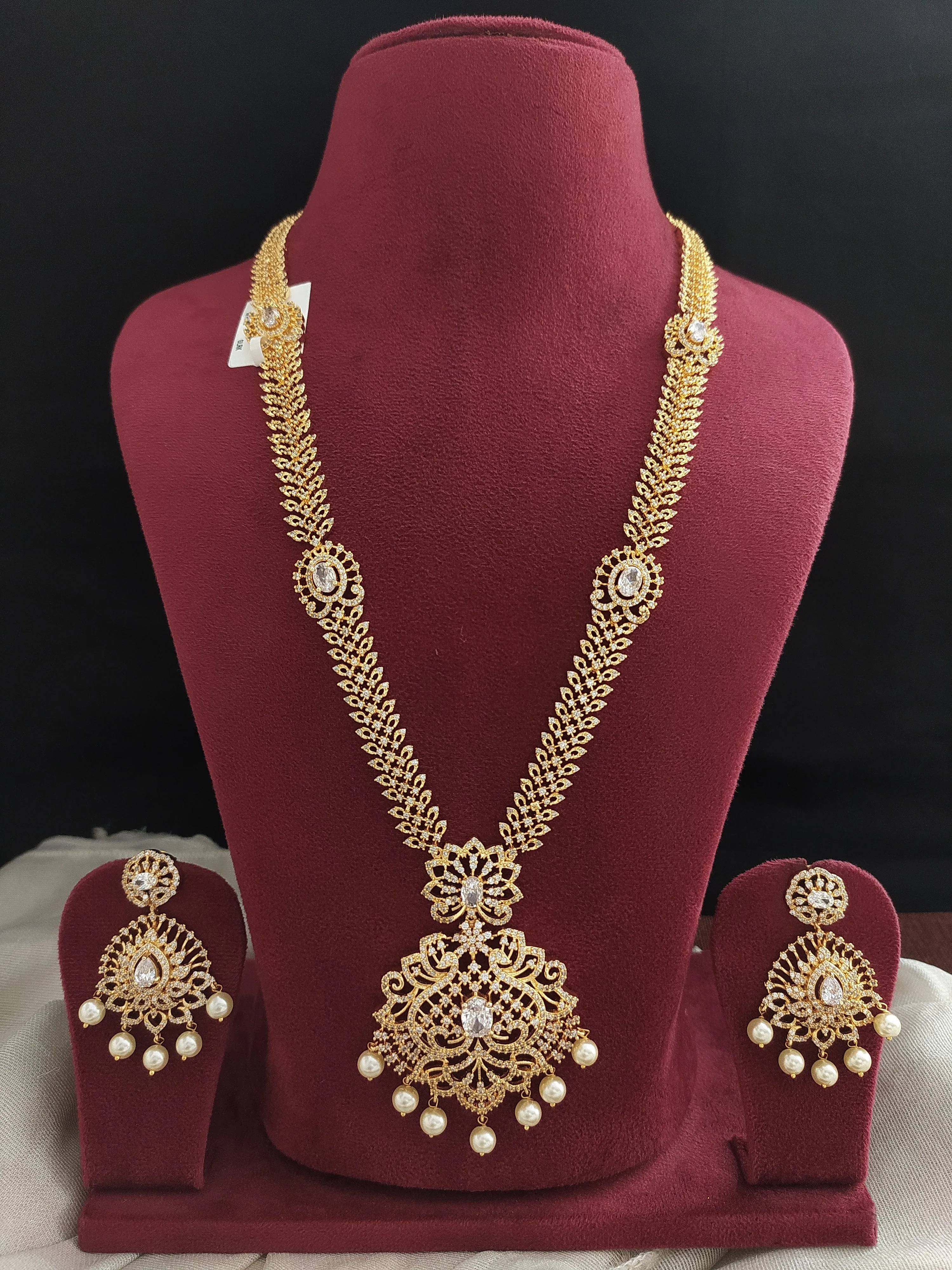 Enchanting Embrace Of Gold Plated Zircon & Pearl Long Haram Set