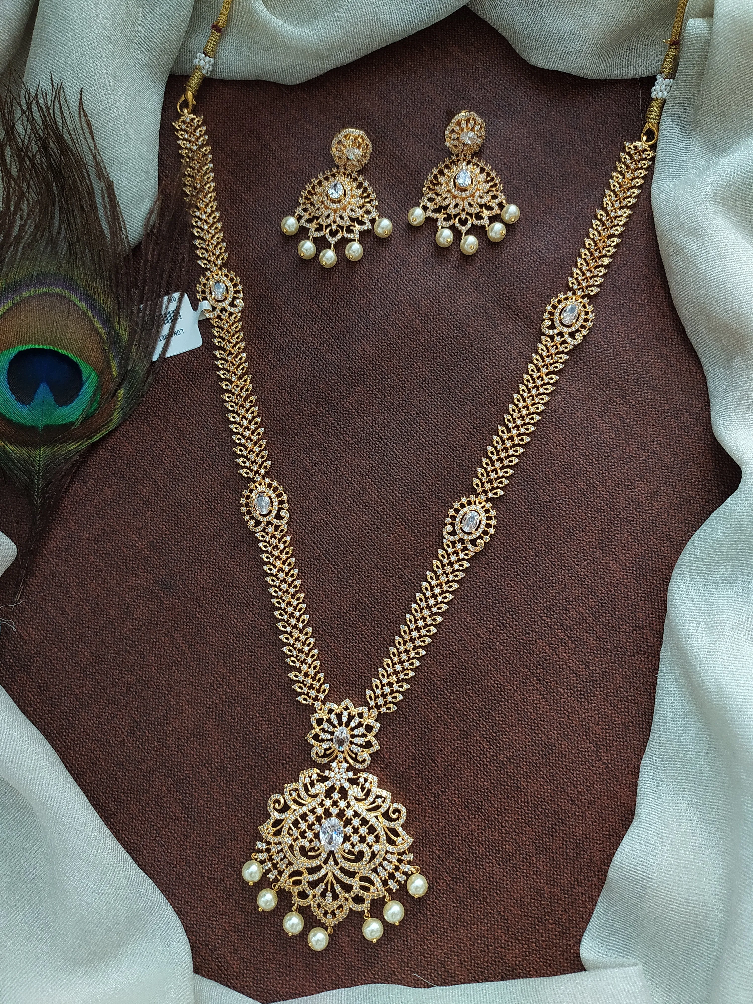 Enchanting Embrace Of Gold Plated Zircon & Pearl Long Haram Set