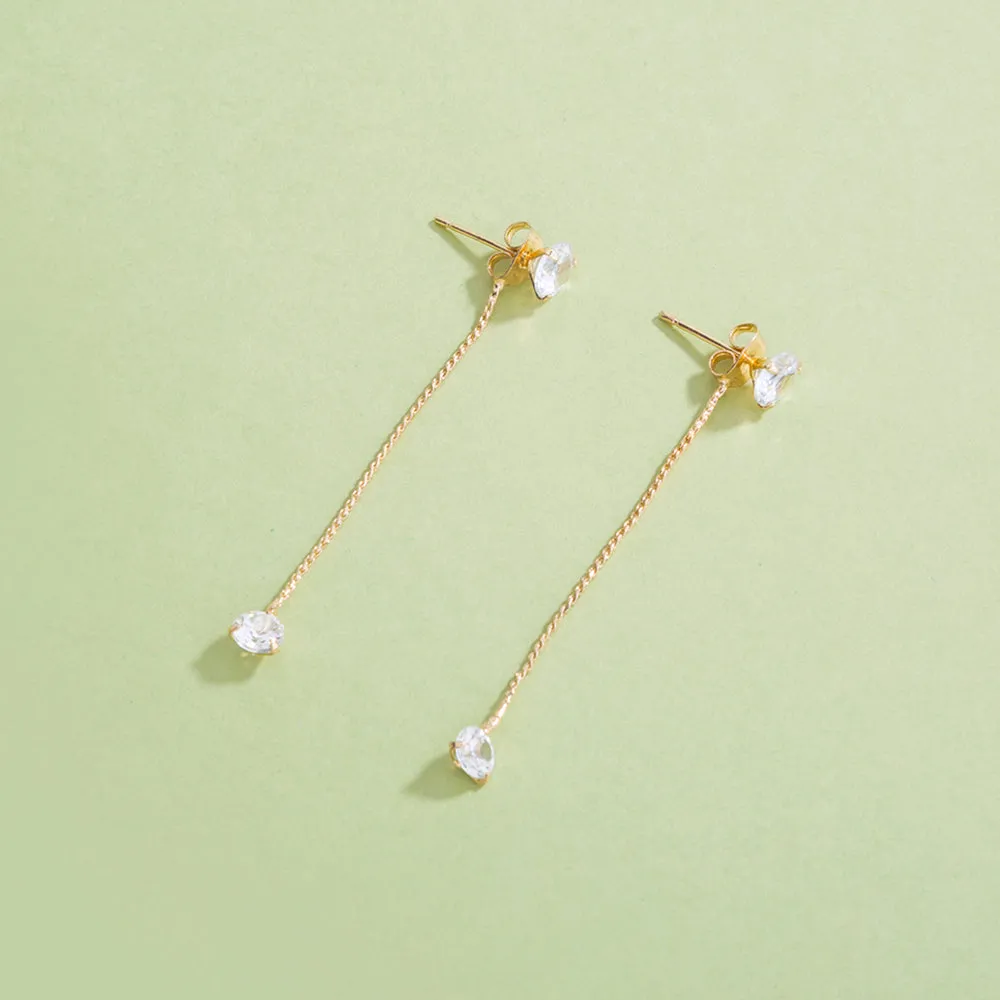 Simple gold with two elegant white zircon earrings