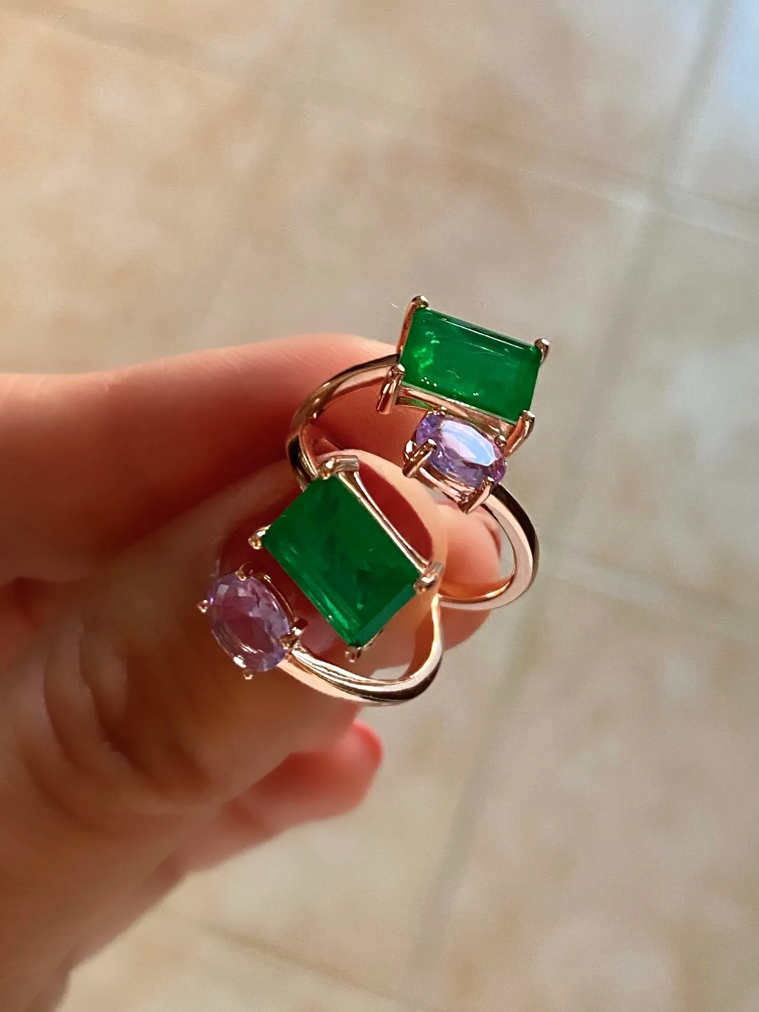 Wraparound ring with large green and pink zircon stones